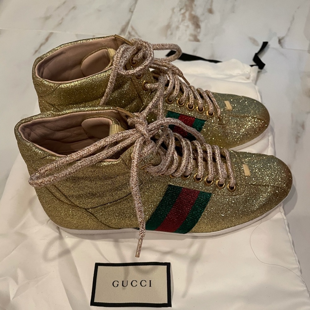 Gold Gucci sneakers